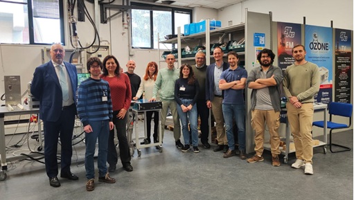Team participating in the tests. The RF module is the box with a black front panel in the middle of the photo. Image